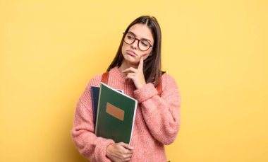 pretty student woman feeling bored, frustrated and sleepy after a tiresome