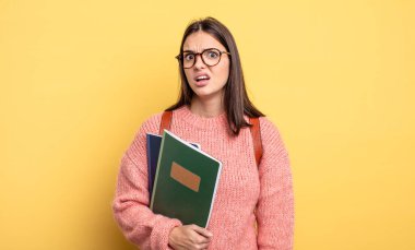 pretty student woman feeling puzzled and confused