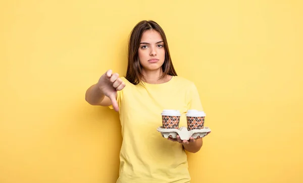 Pretty Woman Feeling Cross Showing Thumbs Take Away Coffee Concept — Stockfoto