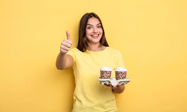 Pretty Woman Feeling Proud Smiling Positively Thumbs Take Away Coffee — Stockfoto