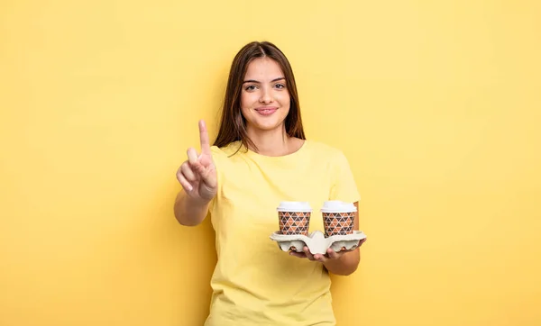 Pretty Woman Smiling Looking Friendly Showing Number One Take Away — Stockfoto