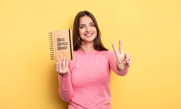 Pretty Woman Smiling Looking Friendly Showing Number Two Recycle Concept — Stockfoto