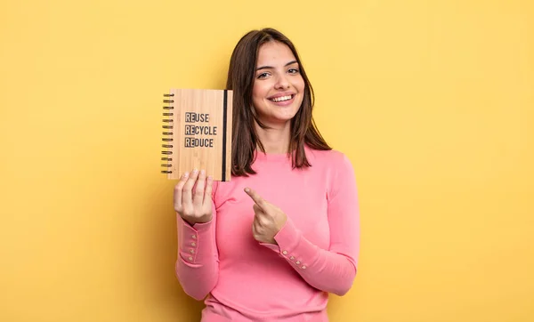 Pretty Woman Looking Excited Surprised Pointing Side Recycle Concept — Stockfoto