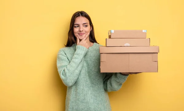 Pretty Woman Smiling Happy Confident Expression Hand Chin Packages Boxes — Stock Photo, Image