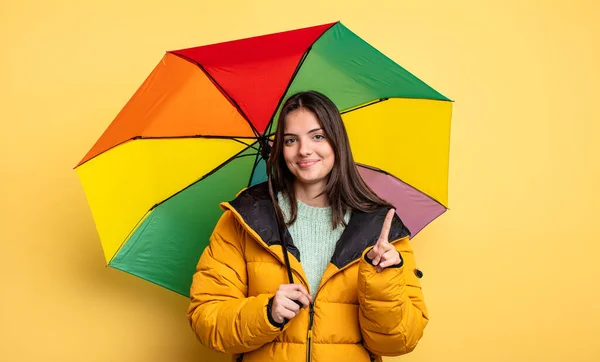 Pretty Woman Smiling Proudly Confidently Making Number One Winter Umbrella — Stock Photo, Image
