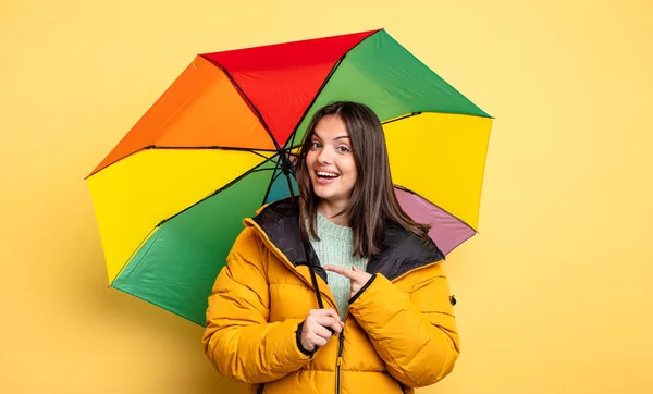 Pretty Woman Looking Excited Surprised Pointing Side Winter Umbrella Concept — стоковое фото