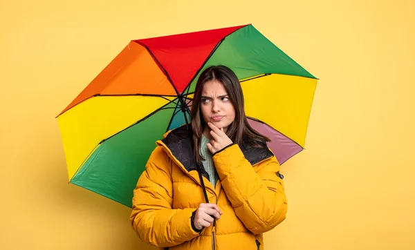 Pretty Woman Thinking Feeling Doubtful Confused Winter Umbrella Concept — стоковое фото
