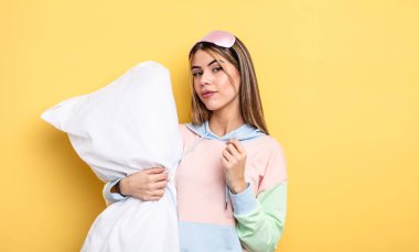 pretty woman looking arrogant, successful, positive and proud. pajamas concept