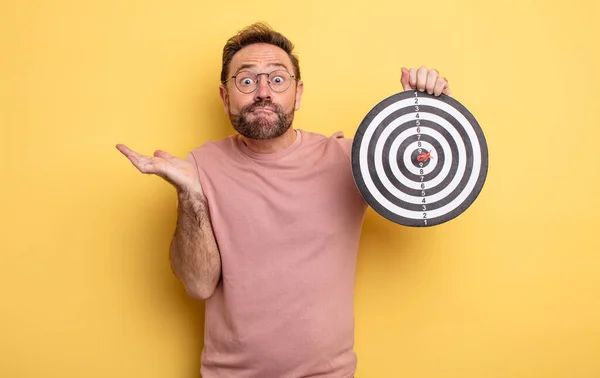 Middle Age Man Feeling Puzzled Confused Doubting Dart Diana Concept — Stockfoto