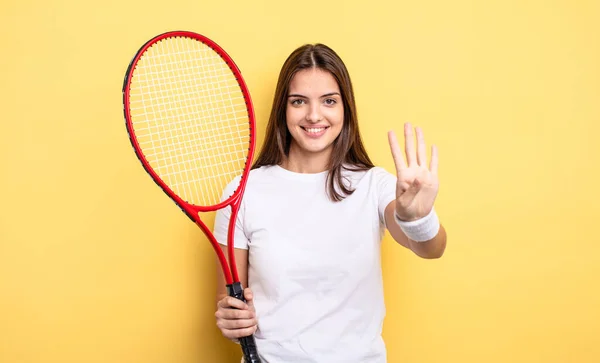 Pretty Woman Smiling Looking Friendly Showing Number Four Tennis Player — Foto Stock
