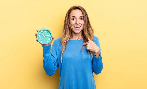 Pretty Woman Feeling Happy Pointing Self Excited Holding Alarm Clock — Foto Stock