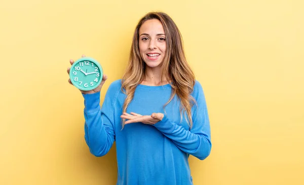 Pretty Woman Smiling Cheerfully Feeling Happy Showing Concept Holding Alarm — Stockfoto