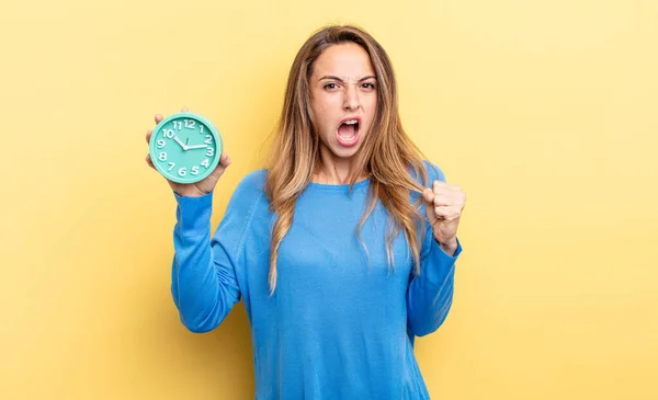 Pretty Woman Shouting Aggressively Angry Expression Holding Alarm Clock —  Fotos de Stock