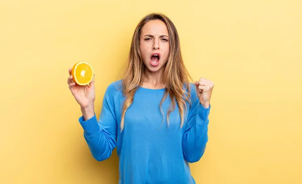 Pretty Woman Shouting Aggressively Angry Expression Holding Half Orange — Fotografia de Stock