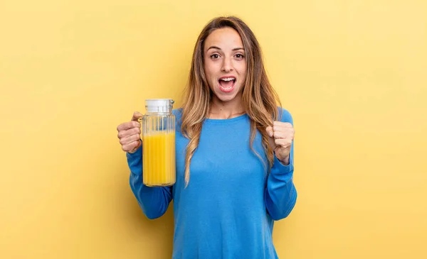 Pretty Woman Feeling Shocked Laughing Celebrating Success Orange Juice Concept — Stockfoto