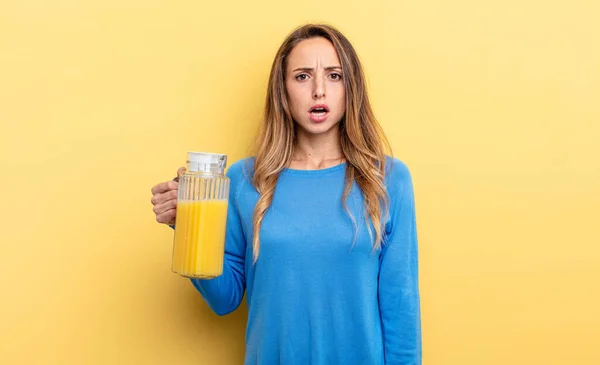 Pretty Woman Looking Very Shocked Surprised Orange Juice Concept — Stock fotografie