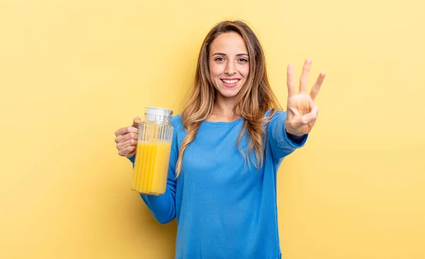 Pretty Woman Smiling Looking Friendly Showing Number Three Orange Juice — Stock Fotó