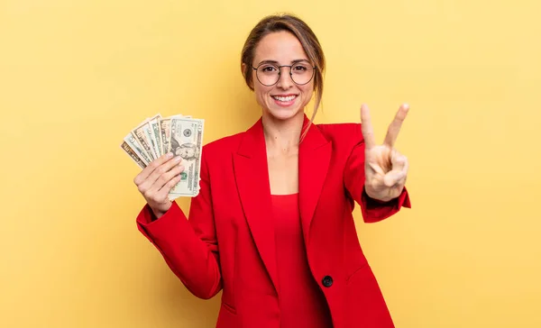 Pretty Woman Smiling Looking Friendly Showing Number Two Business Dollar — Zdjęcie stockowe