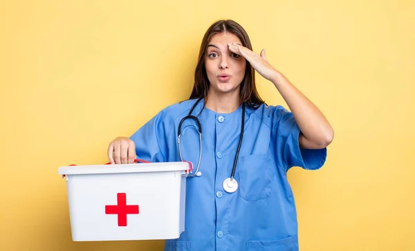 Pretty Woman Looking Happy Astonished Surprised Nurse First Aid Kit — Foto de Stock