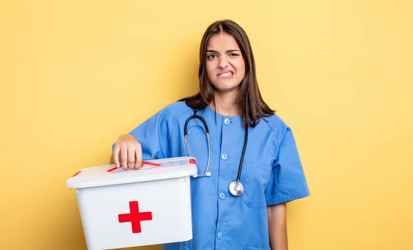 Pretty Woman Looking Puzzled Confused Nurse First Aid Kit Nurse — Fotografia de Stock