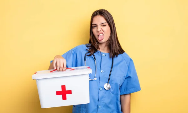 Pretty Woman Feeling Disgusted Irritated Tongue Out Nurse First Aid — Fotografia de Stock