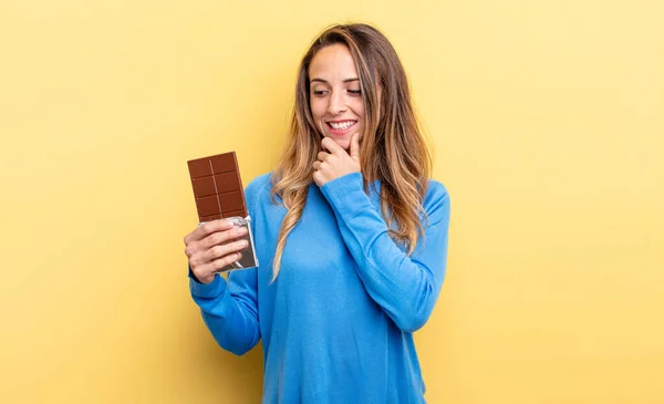 Pretty Woman Smiling Happy Confident Expression Hand Chin Chocolate Concept — стоковое фото