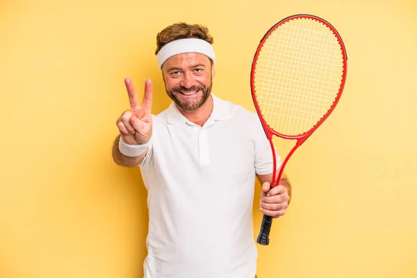 Middle Age Man Smiling Looking Happy Gesturing Victory Peace Tennis — Stockfoto