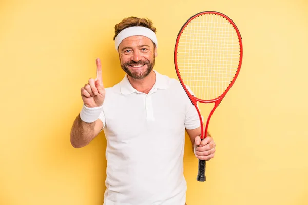Middle Age Man Smiling Looking Friendly Showing Number One Tennis — Stockfoto