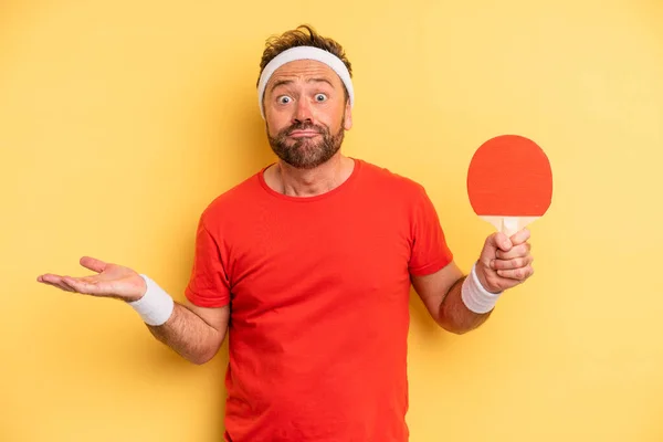 Middle Age Man Feeling Puzzled Confused Doubting Ping Pong Concept — Stock fotografie