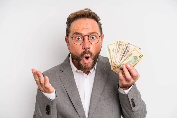 Middle Age Man Feeling Extremely Shocked Surprised Dollar Banknotes Concept — Φωτογραφία Αρχείου