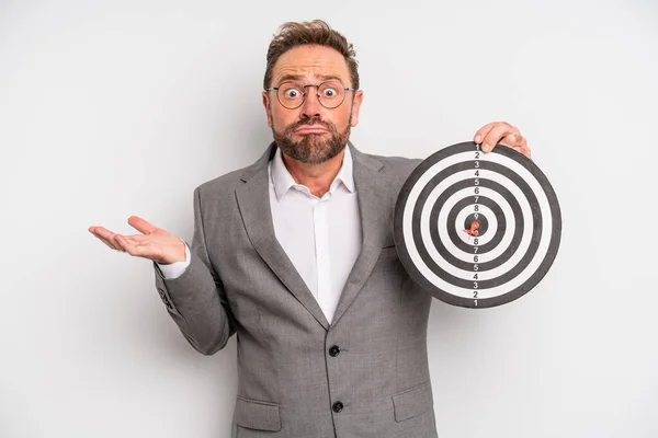 Middle Age Man Feeling Puzzled Confused Doubting Target Darts Concept — Stockfoto
