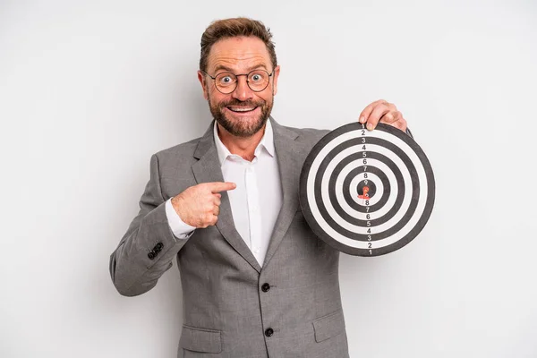 Middle Age Man Feeling Happy Pointing Self Excited Target Darts — Zdjęcie stockowe