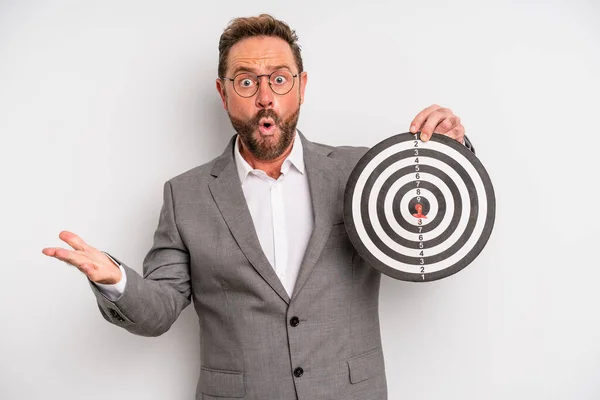 Middle Age Man Feeling Extremely Shocked Surprised Target Darts Concept — Zdjęcie stockowe