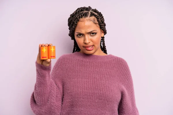 Black Afro Woman Looking Puzzled Confused Battery Concept — Stock Photo, Image