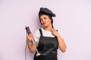 afro black woman feeling stressed, anxious, tired and frustrated. chef with hand blender