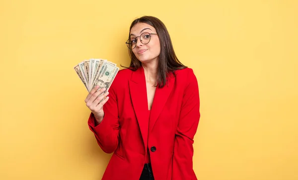 Pretty Woman Shrugging Feeling Confused Uncertain Dollar Banknotes Concept — Stockfoto