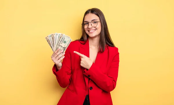 Pretty Woman Smiling Cheerfully Feeling Happy Pointing Side Dollar Banknotes — Foto Stock