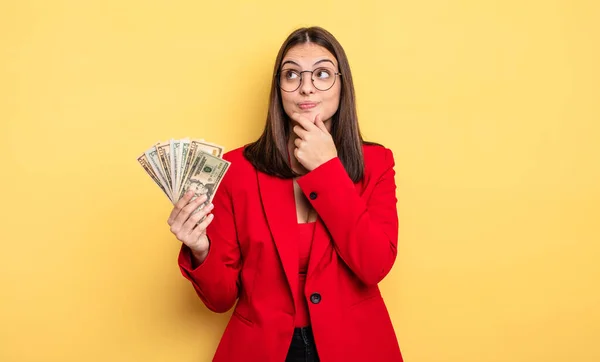 Pretty Woman Thinking Feeling Doubtful Confused Dollar Banknotes Concept — Stockfoto