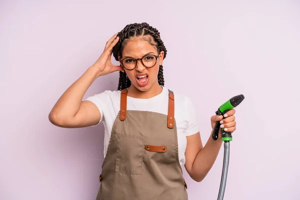 Afro Black Woman Screaming Hands Air Gardener Hose Concept — Zdjęcie stockowe