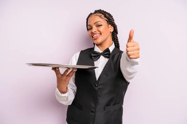 Afro Black Woman Feeling Proud Smiling Positively Thumbs Waiter Tray —  Fotos de Stock