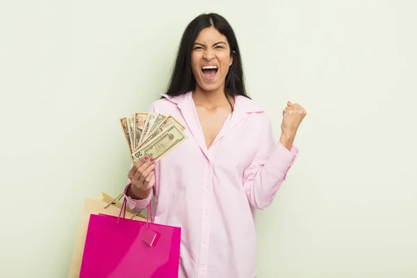 Young Pretty Hispanic Woman Shouting Aggressively Angry Expression Shopping Bags — Stock Photo, Image