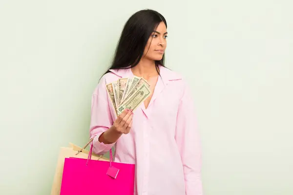 Young Pretty Hispanic Woman Holding Money Royalty Free Stock Images