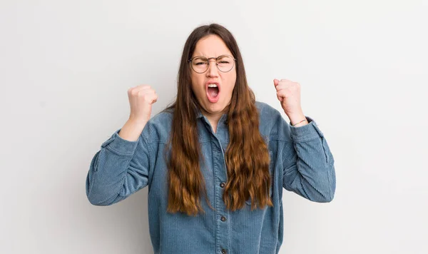 Pretty Caucasian Woman Shouting Aggressively Angry Expression Fists Clenched Celebrating — Zdjęcie stockowe