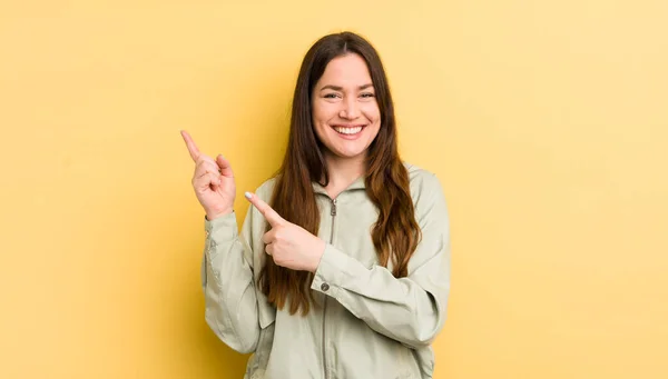 Pretty Caucasian Woman Smiling Happily Pointing Side Upwards Both Hands — Photo