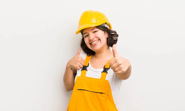 Pretty Hispanic Girl Feeling Proud Smiling Positively Thumbs Worker Concept — Stock Photo, Image