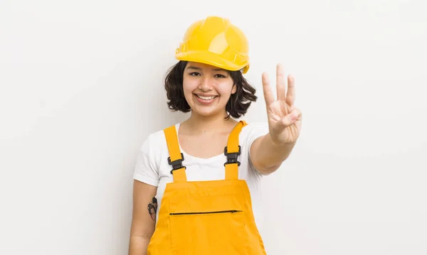 Pretty Hispanic Girl Smiling Looking Friendly Showing Number Three Worker — Stock Photo, Image