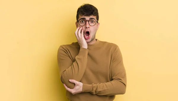 Young Handsome Man Open Mouthed Shock Disbelief Hand Cheek Arm — Stock Photo, Image