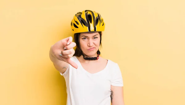 Young Pretty Woman Feeling Cross Showing Thumbs Bike Helmet Concept — Zdjęcie stockowe