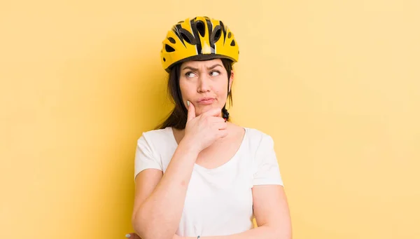 Young Pretty Woman Thinking Feeling Doubtful Confused Bike Helmet Concept — Stockfoto