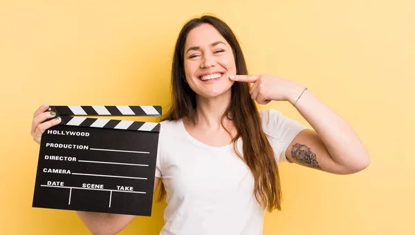 Young Pretty Woman Smiling Confidently Pointing Own Broad Smile Cinema — Stock Photo, Image